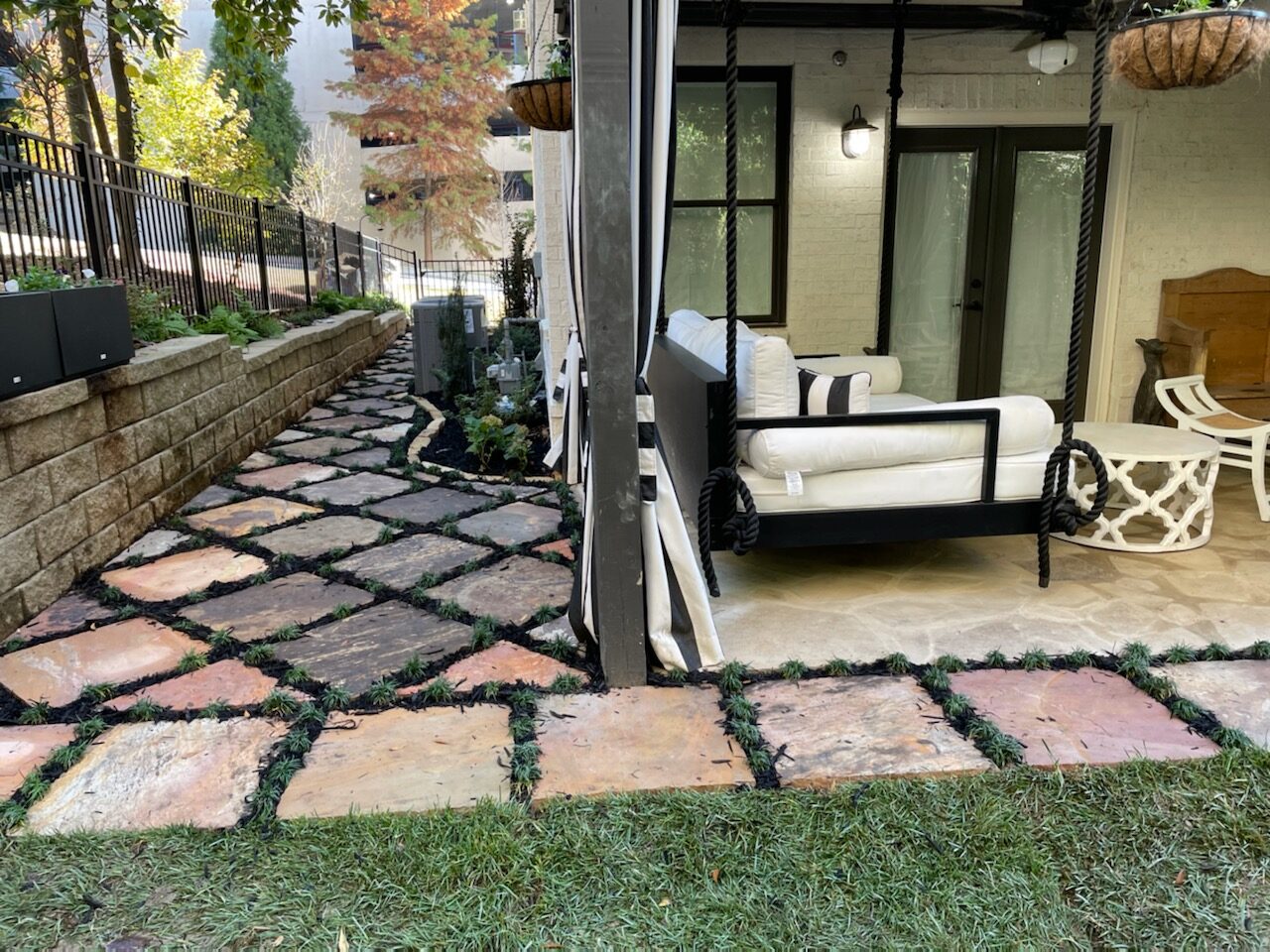 Completed Reliant Services project — a natural stone walkway leading to a Gainesville home